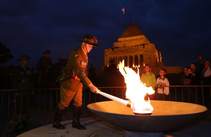 The Anzac  torch is lit at the Shrine Of Remembrance at Melbourne Cricket Ground on April 24, in Melbourne, Australia. 