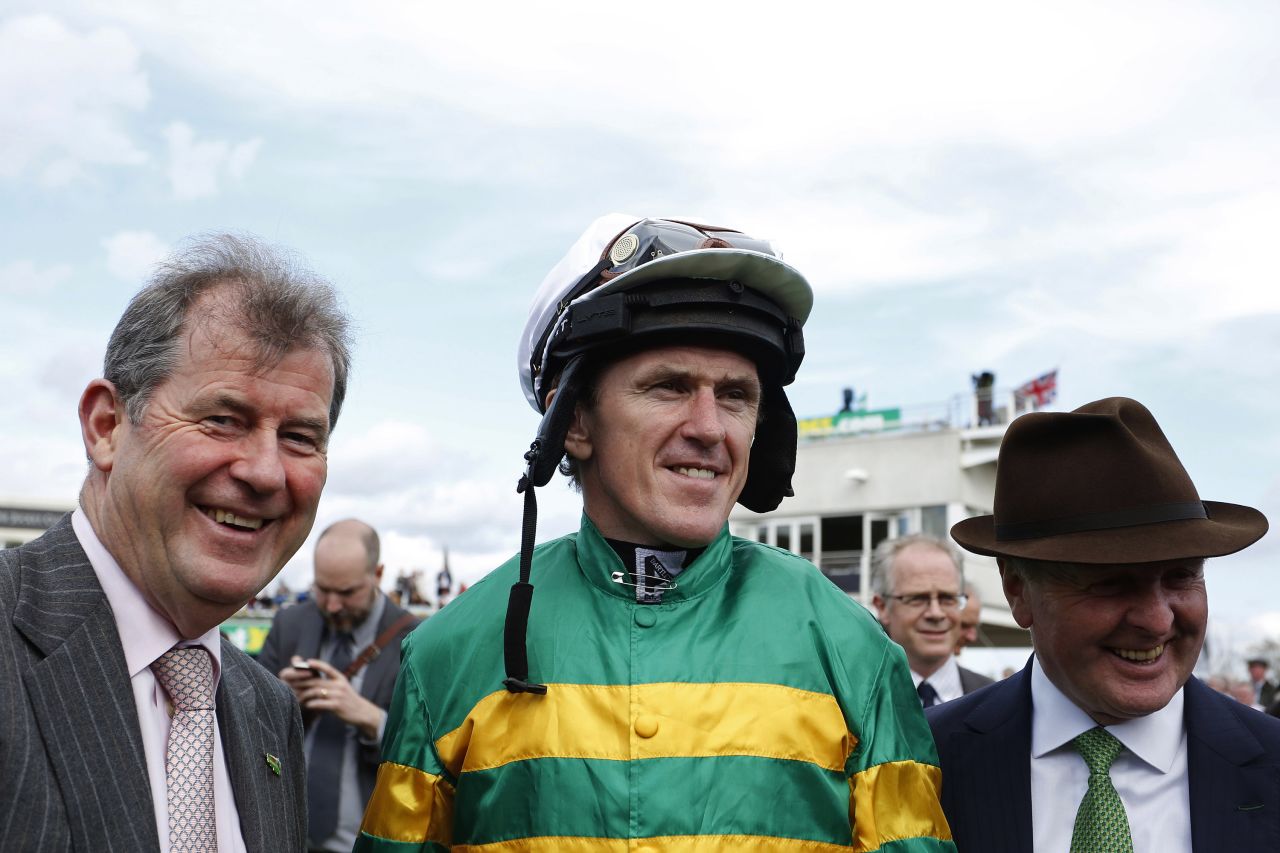 Here he is pictured with his retainer J.P. McManus (left) and Jonjo O'Neill -- who is the Irish billionaire's long-time chief horse trainer. "I started off as his employee and as time has gone on we have become really good friends," McCoy said of McManus.