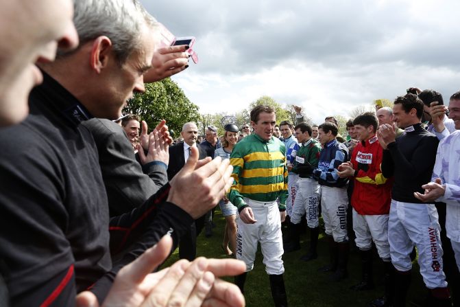 McCoy, who won 4,382 races <a href="index.php?page=&url=https%3A%2F%2Fwww.cnn.com%2F2015%2F02%2F10%2Fhorseracing%2Fap-mccoy-horse-racing-retirement%2Findex.html" target="_blank">and broke just about every bone in his body</a>, was cheered into the parade ring by his fellow jockeys.  