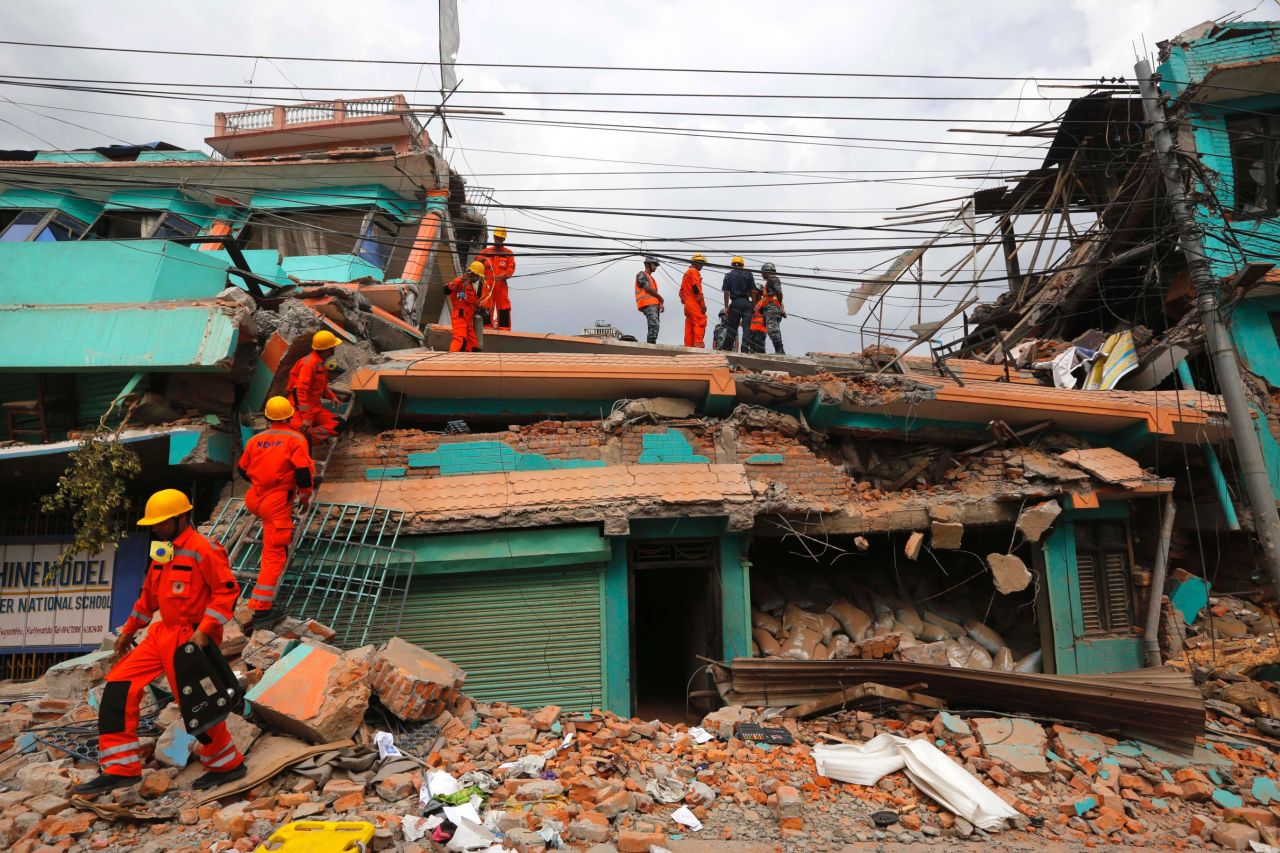 Members of India's National Disaster Response Force look for survivors in Kathmandu on April 26. 