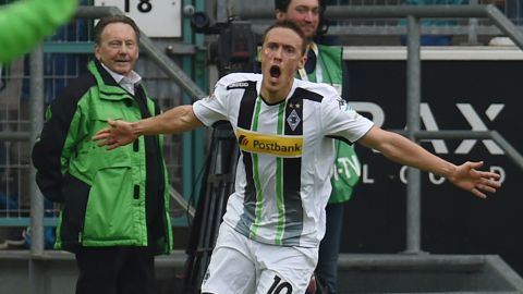 Max Kruse celebrates his late winner for Borussia Moenchengladbach which ensured Bayern Munich clinched the German title.