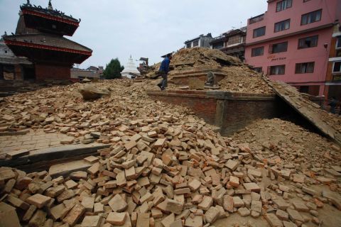 A fallen temple is seen in Nepal's Patan Durbar Square after the 7.8-magnitude earthquake. While many structures in the square were heavily damaged, three major structures -- Krishna Temple, Vishwanath Temple, and Bhimsen Temple (not pictured) -- are believed to have survived largely intact. 