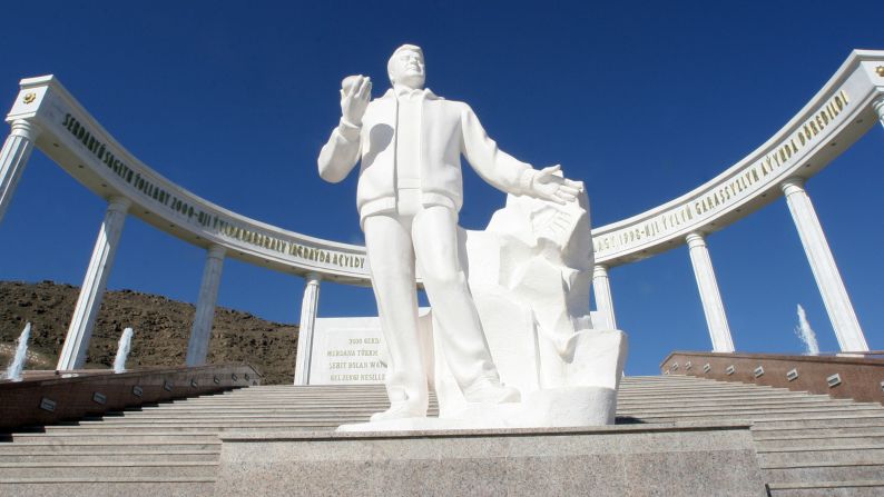 A statue of Turkmenistan's former President Saparmurad Niyazov sits in front of the earthquake memorial in Ashgabat, 13 February 2007. Almost all the brick buildings in Ashgabat, collapsed and 110,000 people were killed when a magnitude-7.3 earthquake struck October 5, 1948.