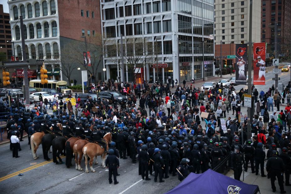 Protesters stand off with police during a march in honor of Gray in Baltimore on Saturday, April 25. 