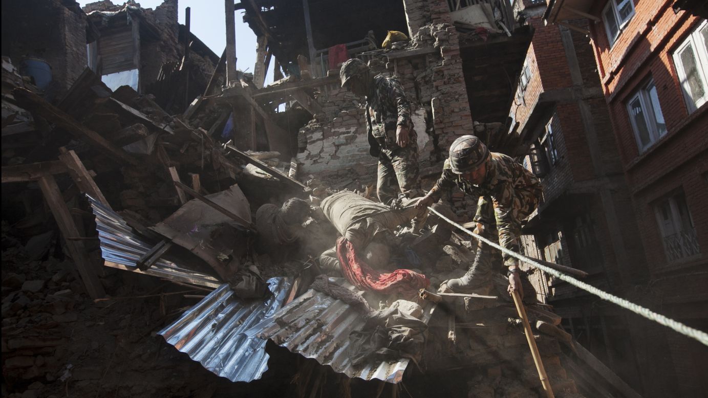 Members of the Nepalese army retrieve bodies from a collapsed building in Bhaktapur near Kathmandu on April 27.