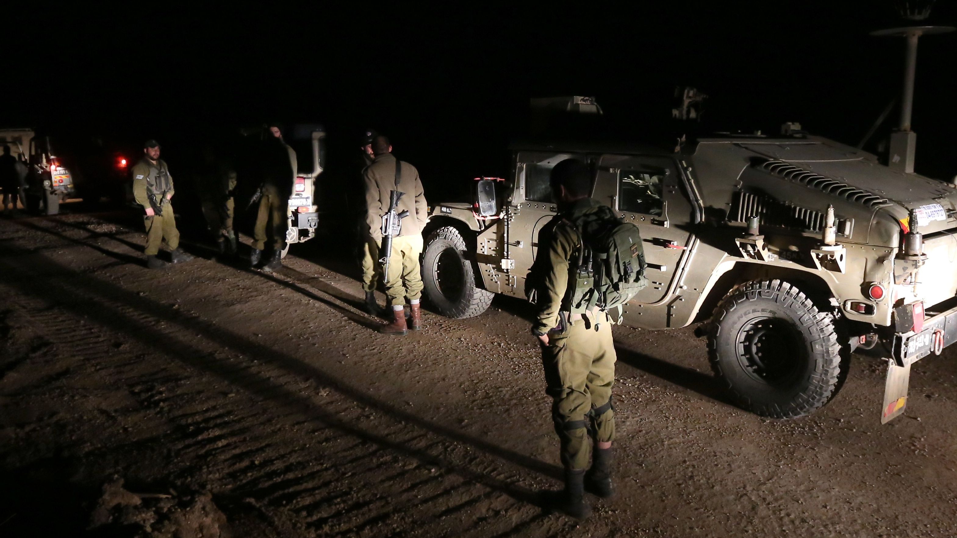 Israeli soldiers patrol the Golan Heights after airstrikes killed militants allegedly trying to plant a bomb.