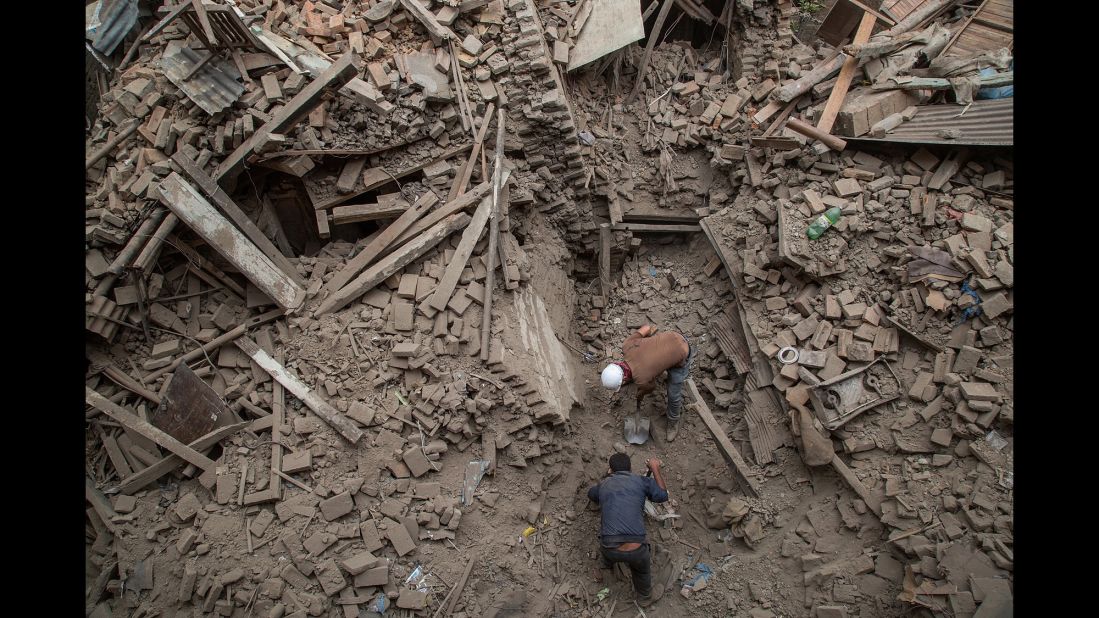 Men clear debris in Bhaktapur on April 26.