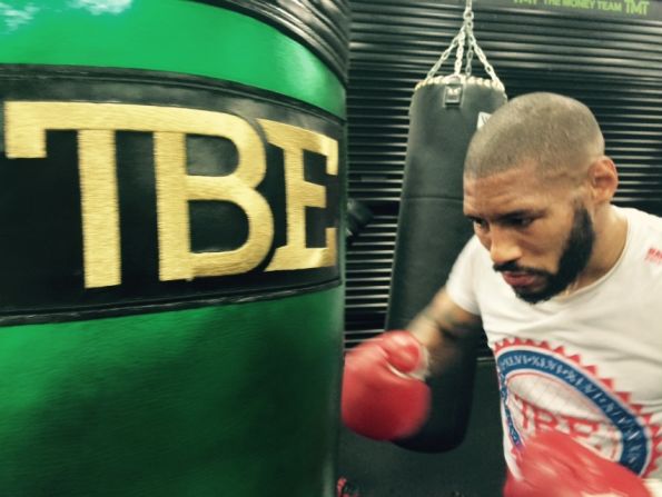 After sparring, Theophane moves to the heavy bag. "I'll normally do 20 minutes on the heavy bag without a break," Theophane tells CNN. The moniker "TBE" on the bag reflects Mayweather's self-dubbed nickname of "The Best Ever."  