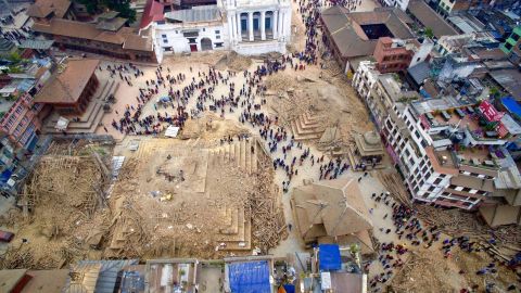 An aerial view of the devastation in Kathmandu on April 27. The destruction in Nepal's capital is stark: revered temples reduced to rubble, people buried in the wreckage of their homes, hospitals short on medical supplies overflowing with patients.