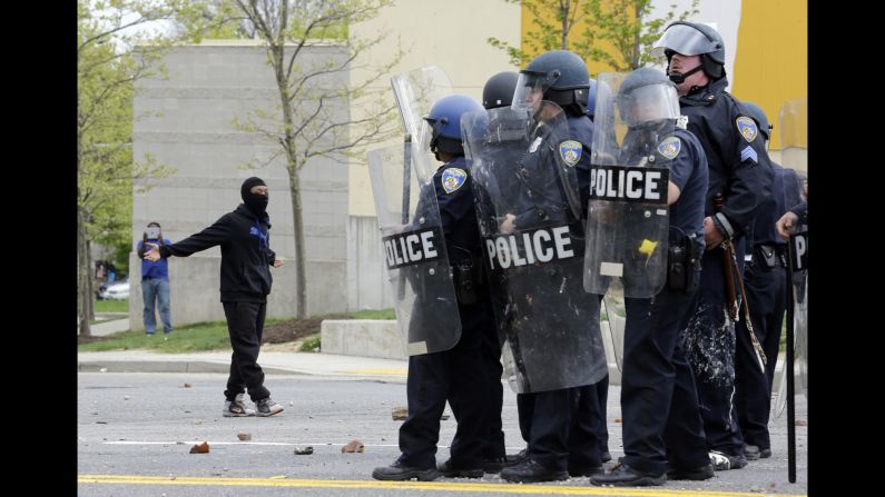 A demonstrator taunts police on April 27.