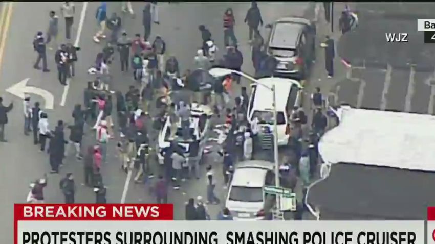 live baltimore protests violent attack police car _00013613.jpg
