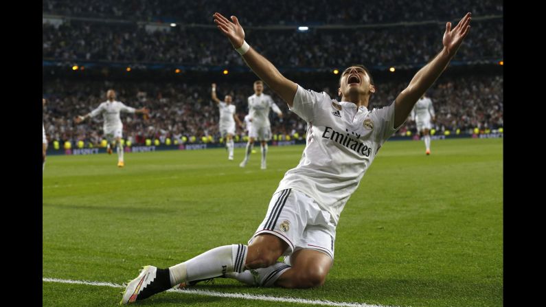 Real Madrid's Javier Hernandez Balcázar, known as Chicharito, celebrates scoring the only goal during the UEFA Champions League quarterfinal second leg soccer match between Real Madrid and Atletico Madrid in Madrid on Wednesday, April 22. 