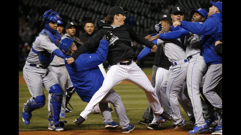Chicago White Sox's Jeff Samardzija, center, fights with Kansas City Royals players during the seventh inning on Thursday, April 23, in Chicago. Edinson Volquez of the Royals was suspended five games for the incident in which he threw a punch intended for Samardzija. Also suspended were Kansas City's Lorenzo Cain (two games), Yordano Ventura (seven games) and Kelvin Herrera (two games), as well as Chicago's Chris Sale (five games) and Samardzija (five games), <a href="index.php?page=&url=http%3A%2F%2Fm.mlb.com%2Fnews%2Farticle%2F120832326%2Froyals-pitcher-edinson-volquez-drops-appeal-of-suspension" target="_blank" target="_blank">according to MLB.</a>