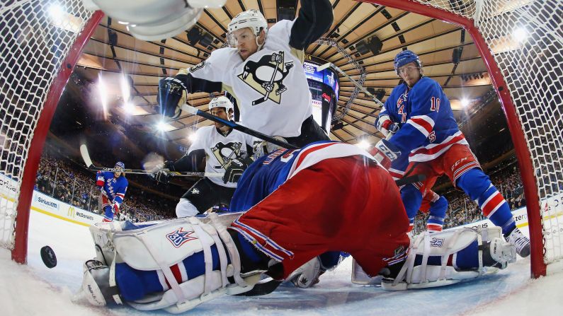 Nick Spaling of the Pittsburgh Penguins scores during the second period against Henrik Lundqvist of the New York Rangers during the 2015 NHL Stanley Cup Playoffs on Tuesday, April 24, in New York.