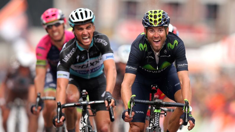 Alejandro Valverde of Spain celebrates his victory as he crosses the finish line ahead of Julian Alaphilippe of France during the 101st Liege-Bastogne-Liege cycle road race on Sunday, April 26, in Liege, Belgium. 