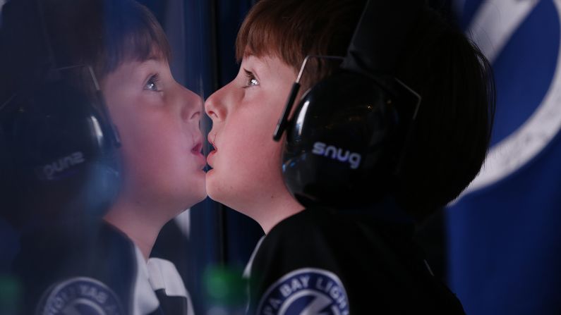 Tampa Bay Lightning fan Sam Freed watches the team warm up before a game against the Detroit Red Wings during the 2015 NHL Stanley Cup Playoffs on Saturday, April 25, in Tampa. Tampa Bay lost to Detroit 4-0.