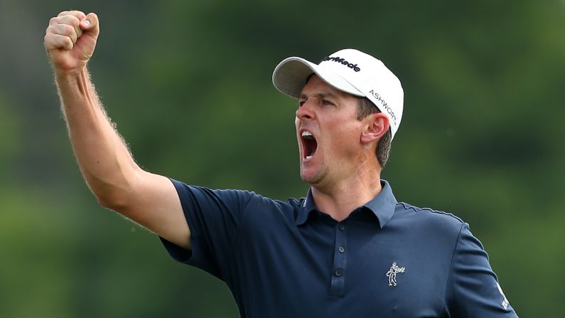 Justin Rose of England reacts after putting in for a birdie on the 18th hole during the final round of the Zurich Classic of New Orleans on Sunday, April 26, in Avondale, Louisiana. <a href="index.php?page=&url=http%3A%2F%2Fwww.cnn.com%2F2015%2F04%2F21%2Fsport%2Fgallery%2Fwhat-a-shot-sports-0421%2Findex.html" target="_blank">See 40 amazing sports photos from last week. </a>