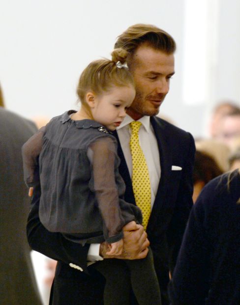 Daughter Harper, born in 2011, attended a presentation of her mom's work at the New York Fashion Week Fall/Winter shows in February 2014.