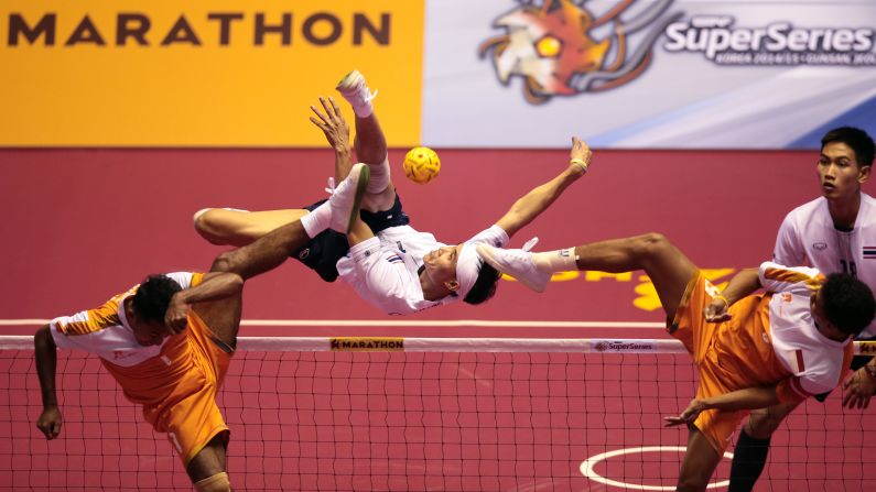 Thailand's Kritsanapong performs an overhead kick during a Sepaktakraw, or kick volleyball, match on Thursday, April 23, in Gunsan City, South Korea.