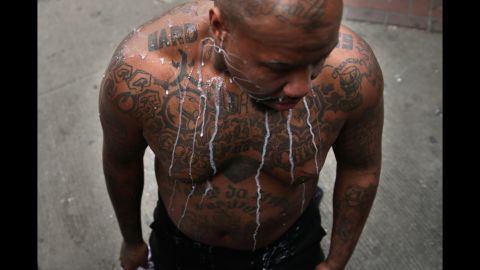 A mixture of milk and water rolls down a man's chest after he was pepper sprayed by the Baltimore Police April 27.