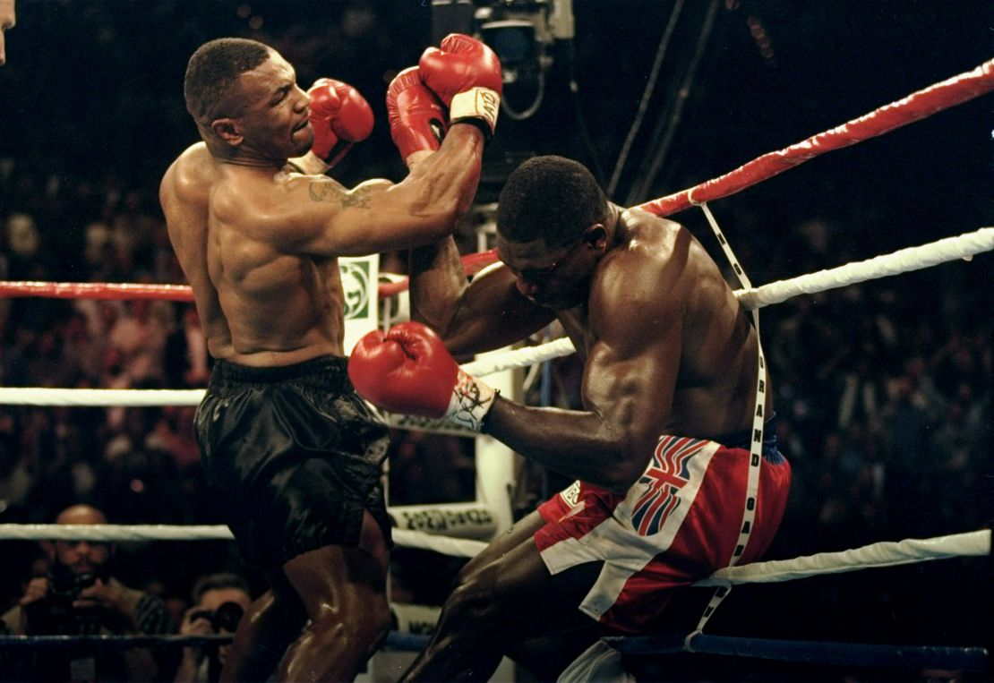 Mike Tyson takes apart British heavyweight boxer Frank Bruno.