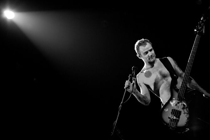 McDonnell photographed Rock and Roll Hall of Fame-inductees Red Hot Chili Peppers. Here's bassist Flea in a quiet moment. 