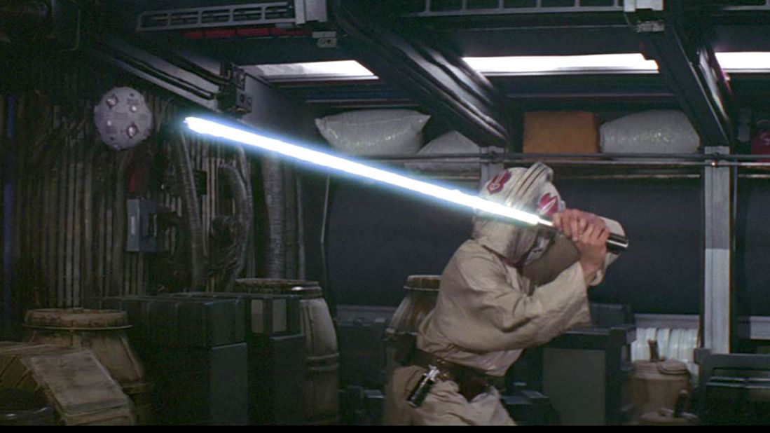 Luke attempts to master the lightsaber, from the original "Star Wars." The young Luke was encouraged to "use the Force" to improve his feel with the weapon.