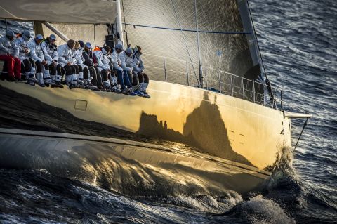 Hovering above the waves in a helicopter, Kurt Arrigo took this photo of  the 112-foot Baltic Nilaya Yacht during the 2012 Rolex Volcano Race. The reflection in the super-yacht's hull shows the Italian island Capri.