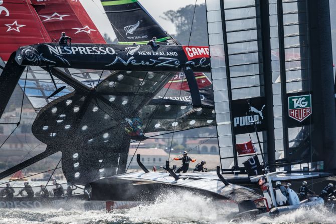 Abner Kingsman's winning photo of 2013 captures the precise moment when Oracle Team USA overtook Emirates Team New Zealand -- which was on the brink of capsizing -- during the 34th America's Cup.
