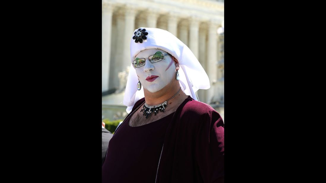 Senior Novice Sister Sedusa Poly Tishun shows off her face paint outside the Supreme Court. "We're here raising up our voices and our glitter in shouts of joy in support of marriage equality," Tishun said.