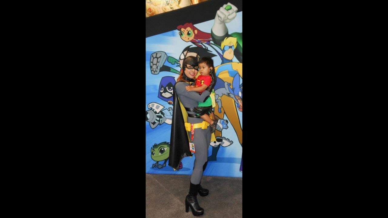 Mother and son make a real dynamic duo as Batgirl and Robin at the San Diego Comic-Con in 2012.