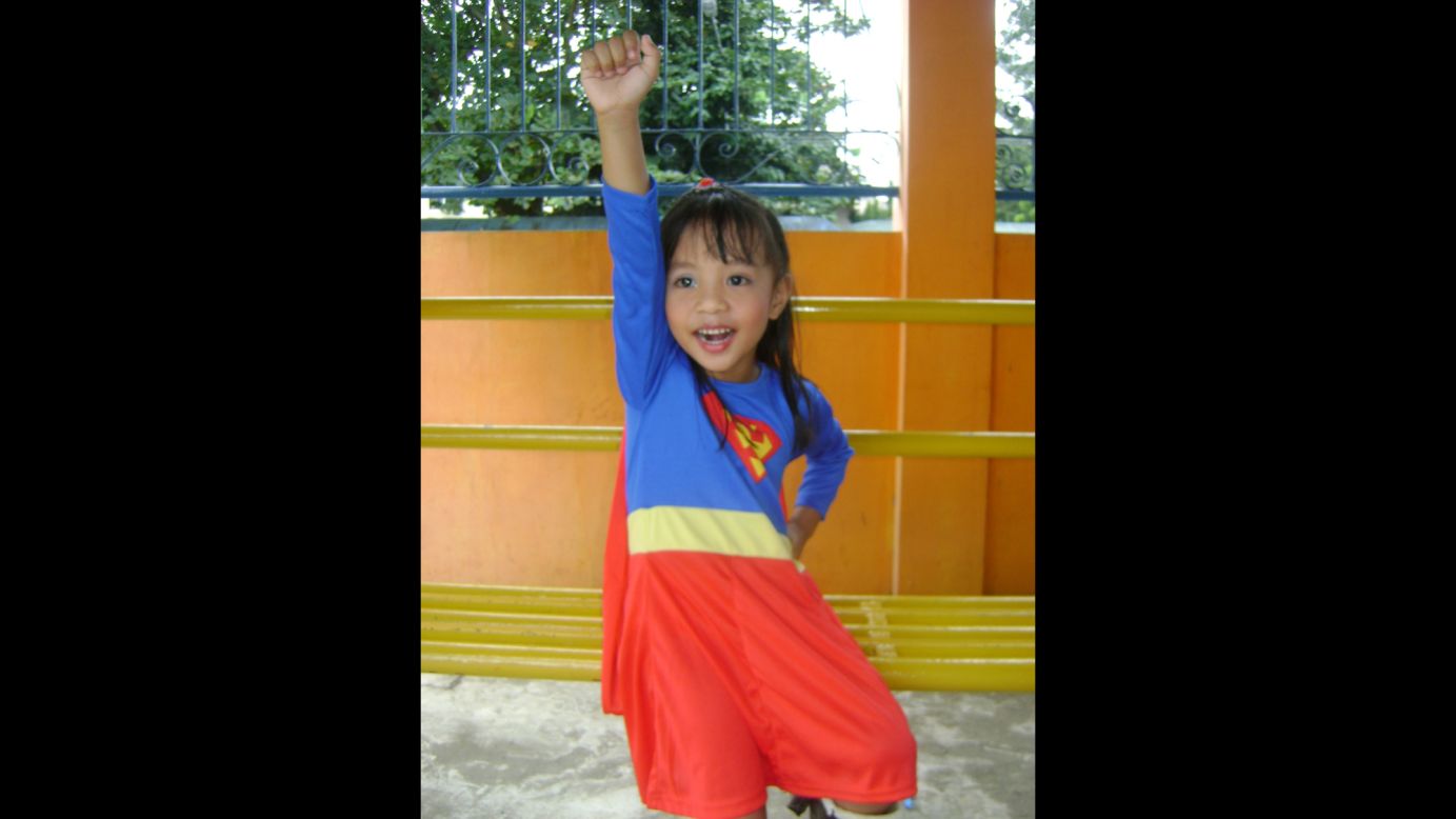 Four-year-old Anthea Ballais of Tacloban, Philippines, is <a href="http://ireport.cnn.com/docs/DOC-979832">seen here</a> imagining herself soaring through the air as Supergirl.
