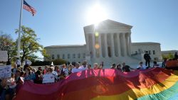 Supporters of same-sex marriages gather outside the U.S. Supreme Court waiting for its decision on April 28, 2014 in Washington, D.C.