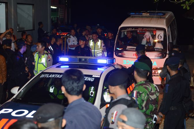 A police car escorts an ambulance carrying the coffin bearing the body of one of the eight executed drug convicts as it arrives in Nusakambangan port in Cilacap after the executions at Nusakambangan maximum security prison island on Wednesday, April 29. <a href="index.php?page=&url=http%3A%2F%2Fedition.cnn.com%2F2015%2F04%2F28%2Fasia%2Findonesia-firing-squad-executions%2F" target="_blank"> Indonesia  executed eight convicted drug smugglers -- including two of the so-called "Bali Nine" -- the Reuters news agency reported, citing local media</a>, despite a firestorm of international criticism and last-ditch pleas by the condemned prisoners' families. 