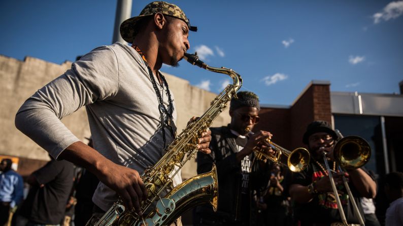 A band plays music during protests on April 28 in Baltimore.