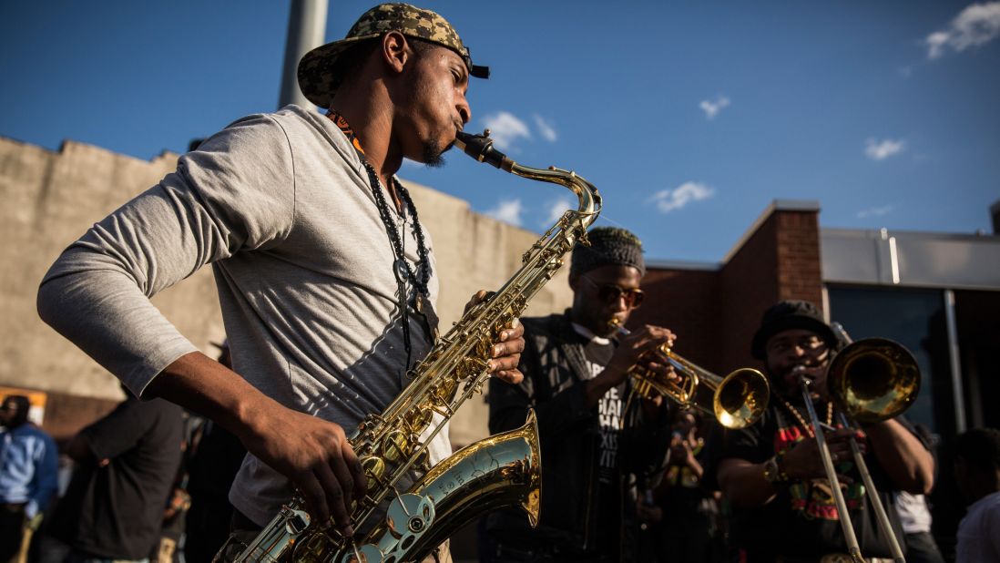 A band plays music during protests on April 28 in Baltimore. 