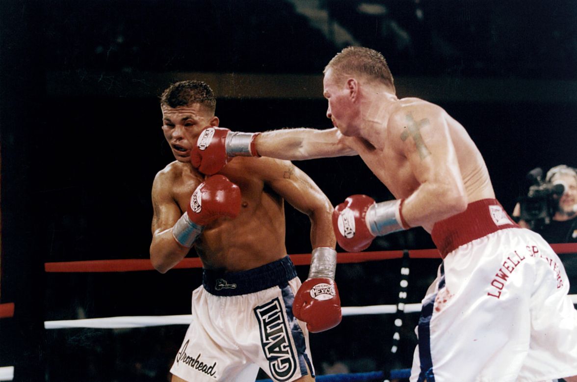The first from the epic trilogy between Ward and Gatti took place on May 18, 2002. <br />The pair traded savage blows from the bell. The mutual beat down didn't abate for nine rounds, by which point Ward had a fair few cuts to his face. But he'd managed to knock Gatti, who was suffering from an increasingly swollen left eye, to the floor and won by majority decision in the 10th.<br /><br />