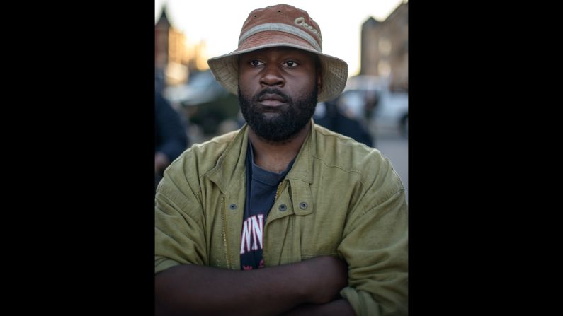 "There were 26 Baltimore citizens forming a human wall, separating the crowd from the police, for their mutual protection," Larson says. He spoke with and took photos of 22 of the participants.