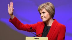  Nicola Sturgeon waves as she gives her first key note speech as SNP party leader at the party's annual conference on November 15, 2014 in Perth, Scotland. Nicola Sturgeon formally took over the leadership of the SNP from Alex Salmond yesterday, during her speech she urged voters to leave Labour in next May's UK election