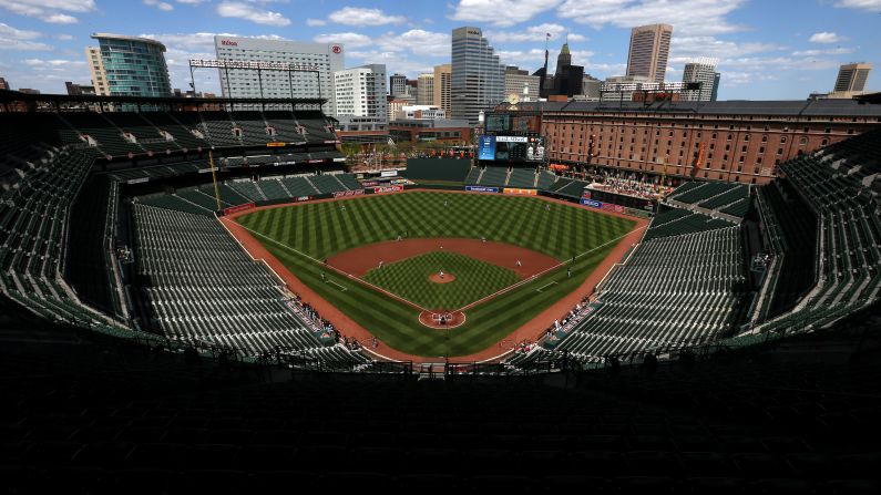 The Baltimore Orioles take on the Chicago White Sox in the first inning at an empty Oriole Park at Camden Yards on Wednesday, April 29. The <a href="index.php?page=&url=http%3A%2F%2Fwww.cnn.com%2F2015%2F04%2F29%2Fus%2Fbaltimore-surreal-scenes%2Findex.html">baseball game was played in a stadium closed</a> to the public after unrest in Baltimore following the death of Freddie Gray, a 25-year-old man who died after suffering a severe spinal injury in police custody.