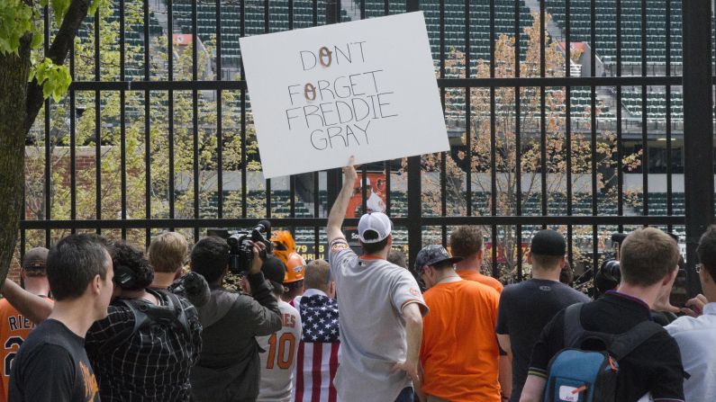 Fans view the game from outside Oriole Park. 