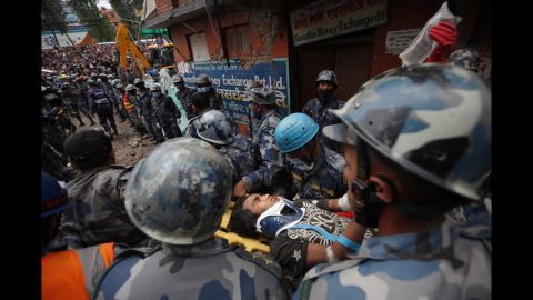 A teenage boy gets rushed to a hospital April 30 <a href="http://edition.cnn.com/2015/04/30/asia/nepal-earthquake/index.html">after being rescued from the debris of a building</a> in Kathmandu days after the earthquake.