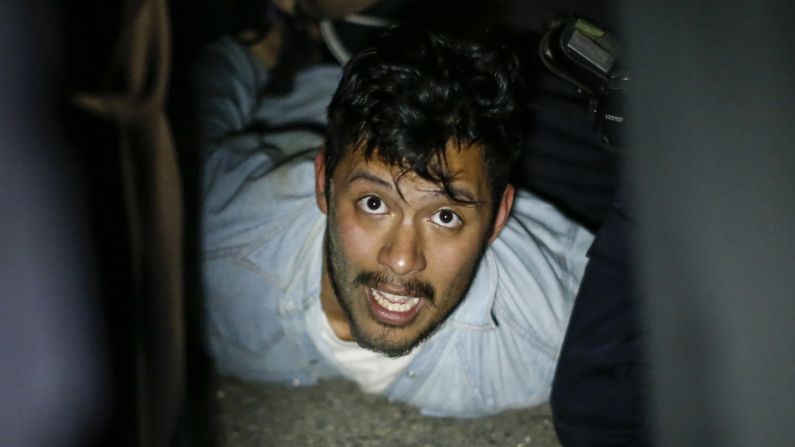 Police restrain a man during a "NYC Rise Up & Shut It Down With Baltimore" rally April 29 in New York.