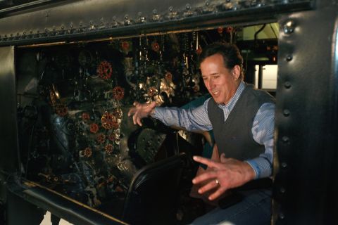 Santorum tours a train engine during an expedition stop at the National Railroad Museum on April 1, 2012 in Green Bay, Wisconsin.