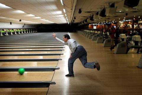 Santorum bowls at Saber Lane in Menasha, Wisconsin, after a campaign rally on April 2, 2012. 