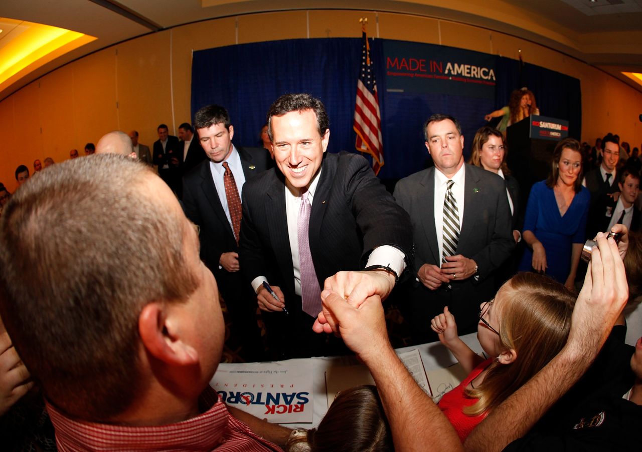 Santorum addresses supporters  in Lafayette, Louisiana, after winning the Alabama and Mississippi primaries on March 13, 2012.