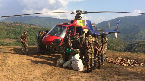 Helicopters operated by the Nepalese military bring tents, tarps, food and baby supplies to the most-damaged areas in the Gorkha district.