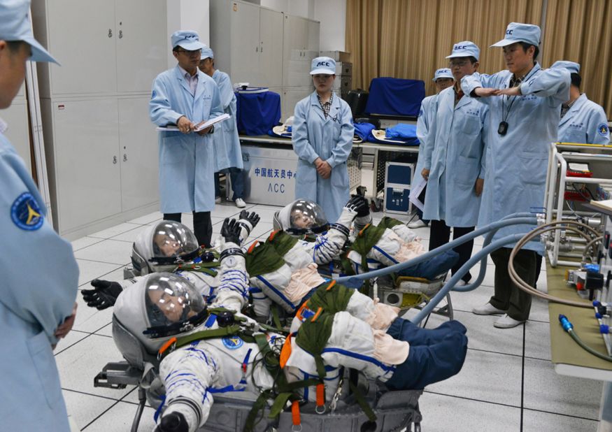 The astronauts had to undergo a series of tests in their pressure suits prior to the mission.