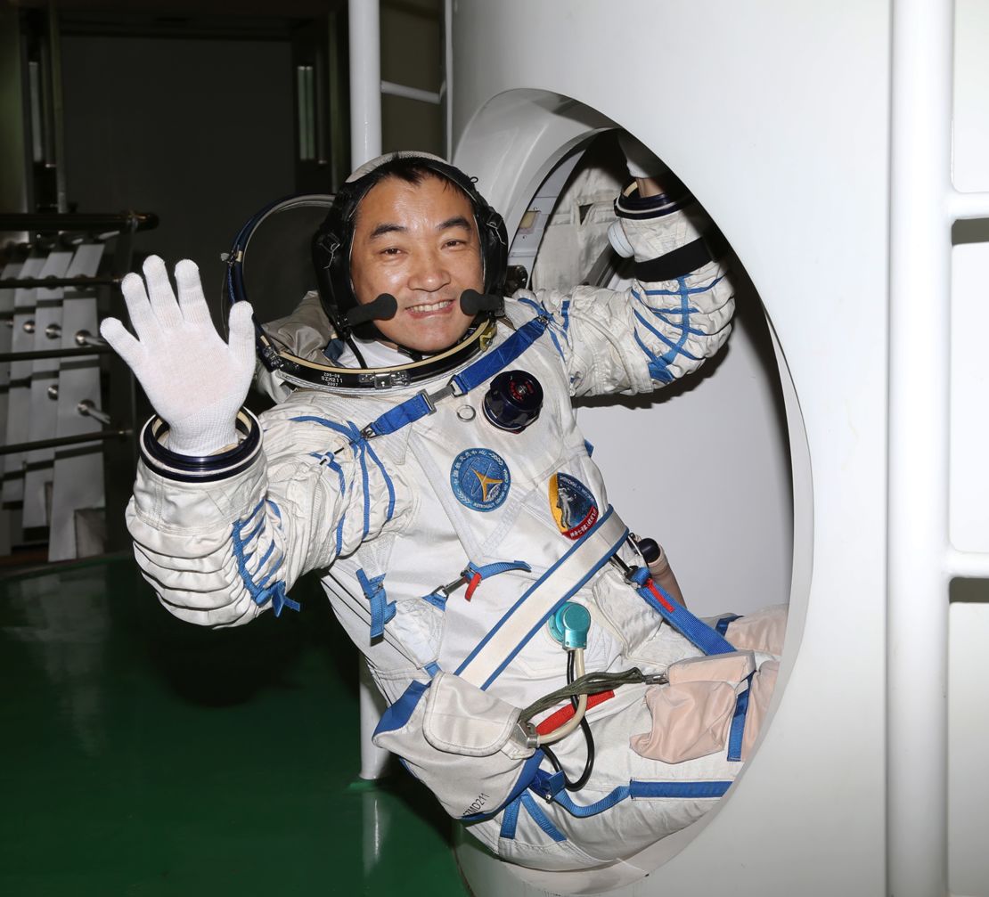 Zhang Xiaoguang practices entering return capsule on May 31, 2013.