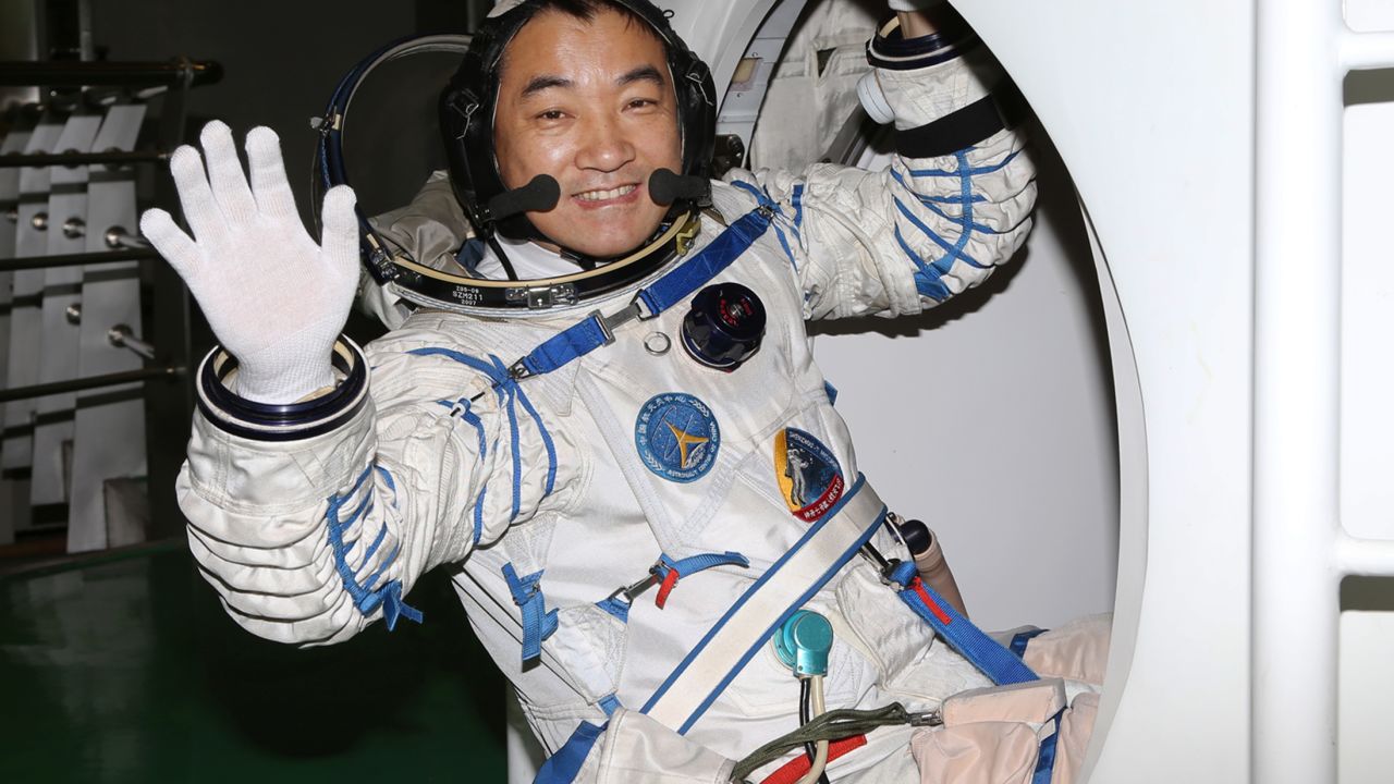 Zhang Xiaoguang practices entering return capsule on May 31, 2013.